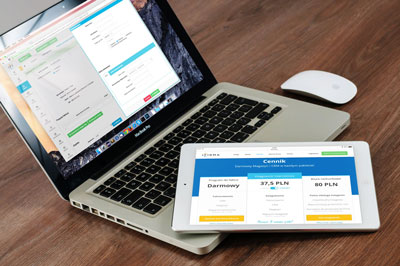 Website building on laptop and QA checking on iPad